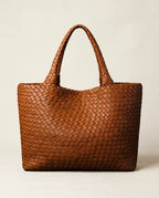 Lana | Handwoven Leather Tote in KIM London product styling